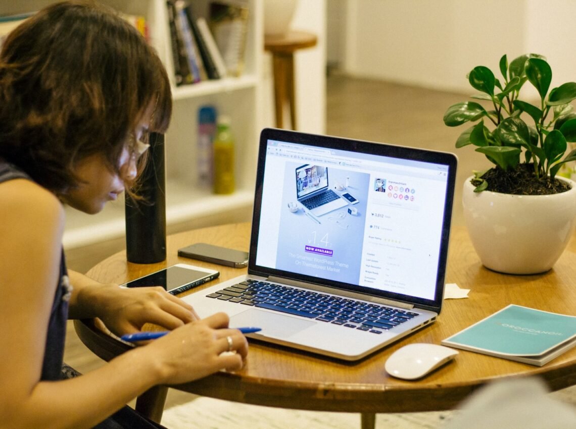 woman browsing on her laptop